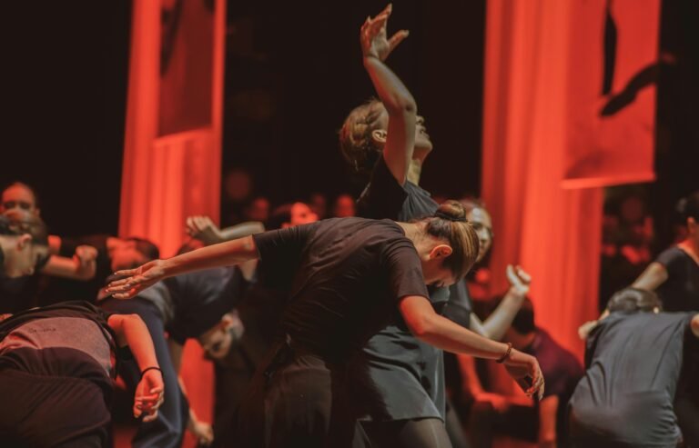 Dynamic dance performance captured with vivid lighting and expressive movement.
